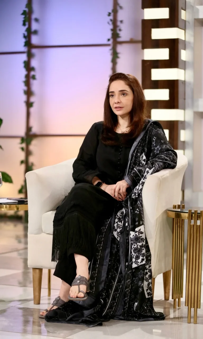 Juggan Kazim wearing Naureen Jamal